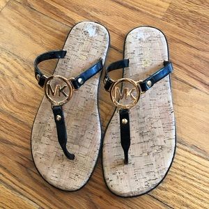 MICHAEL Michael Kors black jelly flip flops